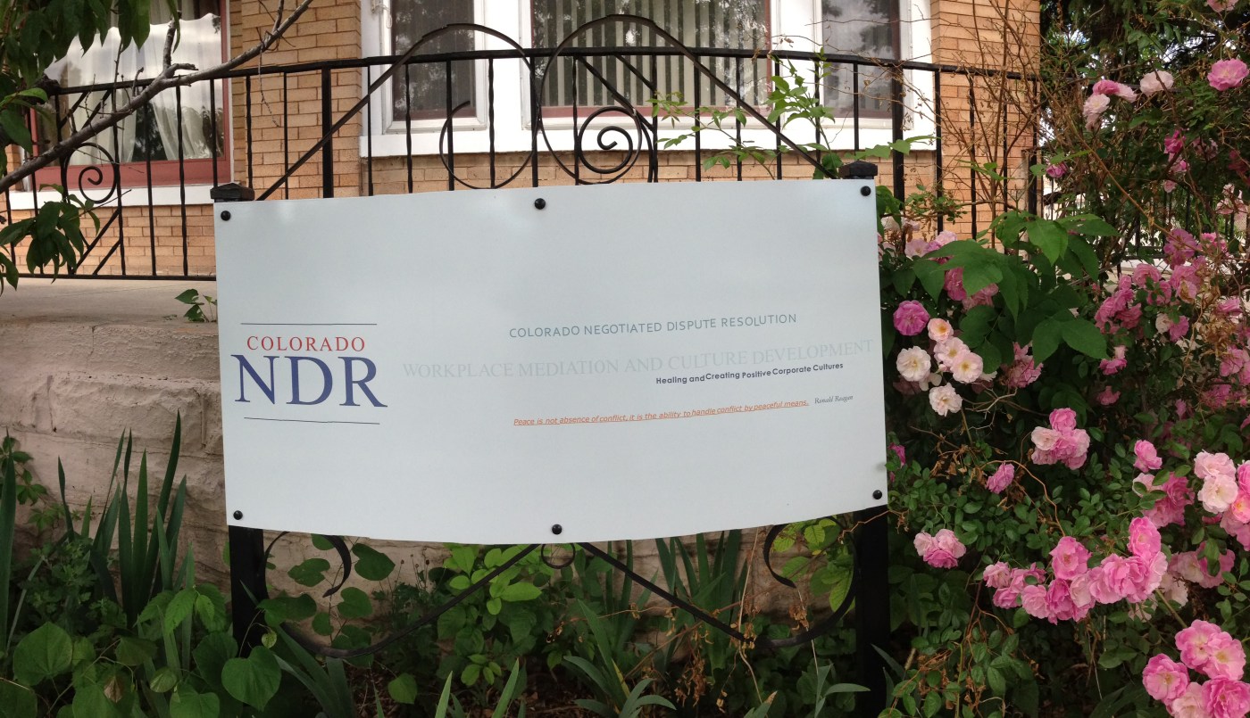 Photo of Colorado NDR dispute resolution sign in rose garden